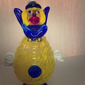 Glass clown figurine.